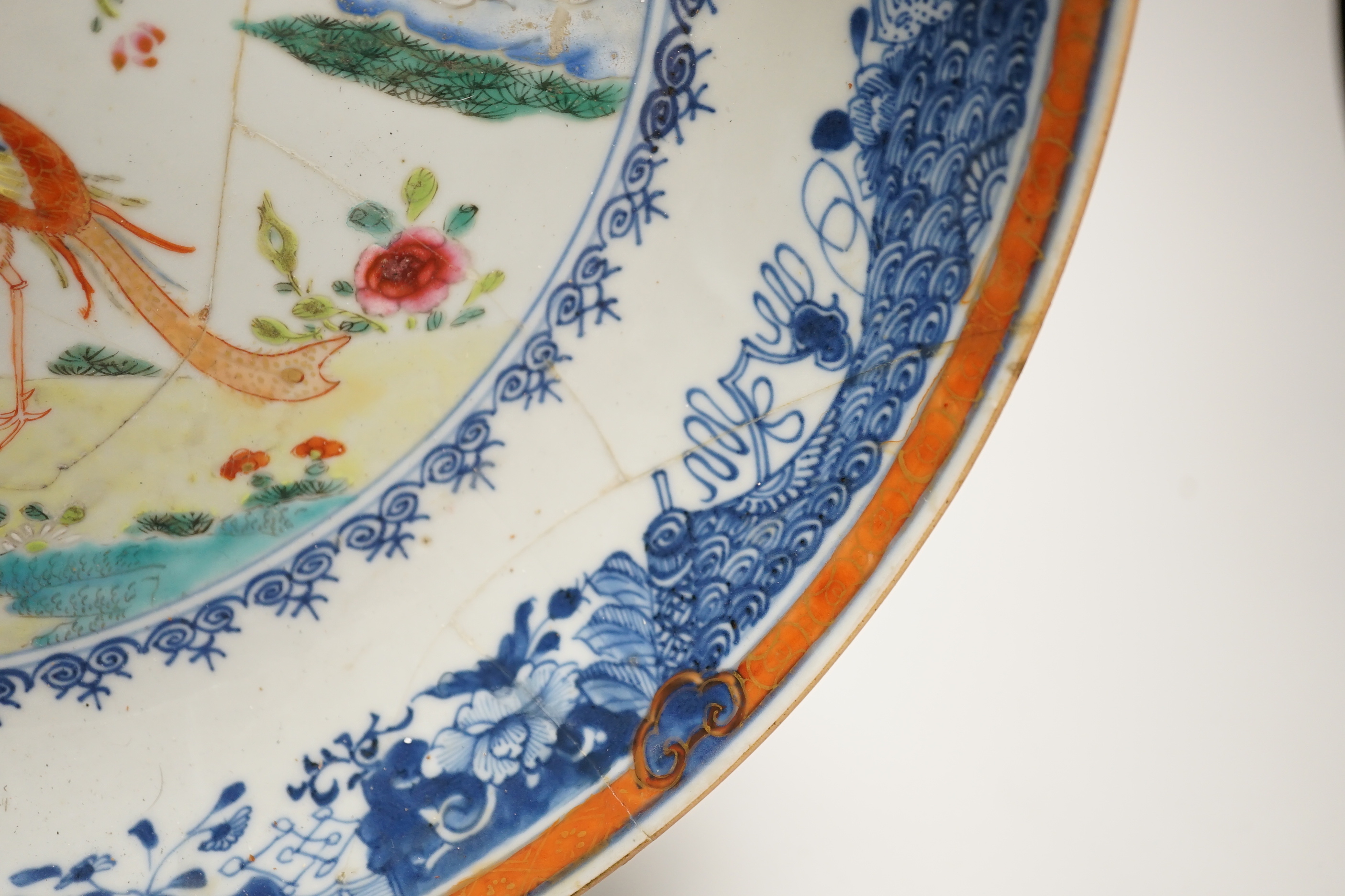 An 18th-century Chinese export famille rose twin pheasant dish and a pair of blue and white bowls, the largest 30cm in diameter